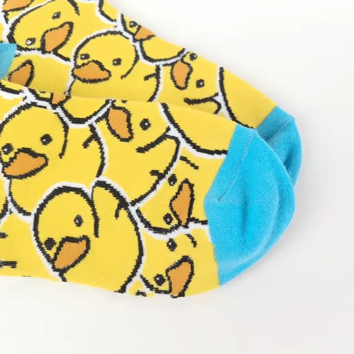 1 paire de chaussettes mi-mollet en canard jaune vif