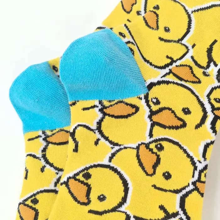 1 paire de chaussettes mi-mollet en canard jaune vif