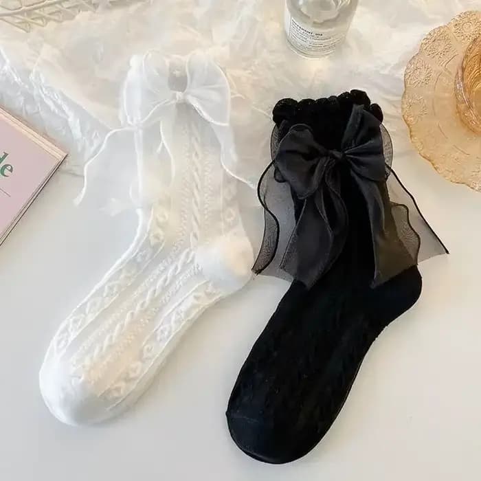 Chaussettes mi-tube en dentelle unie avec nœud à volants