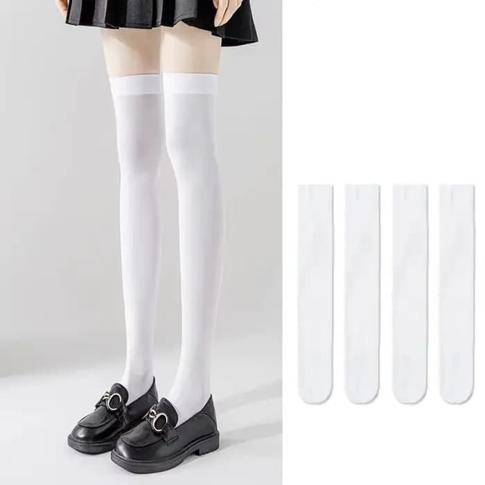 Chaussettes longues de couleur unie