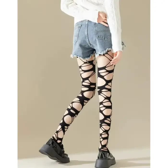 Collants résille noirs sexy déchirés pour femmes