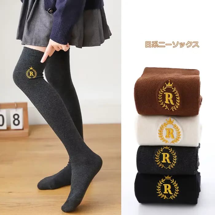 1 paire de chaussettes hautes pour filles