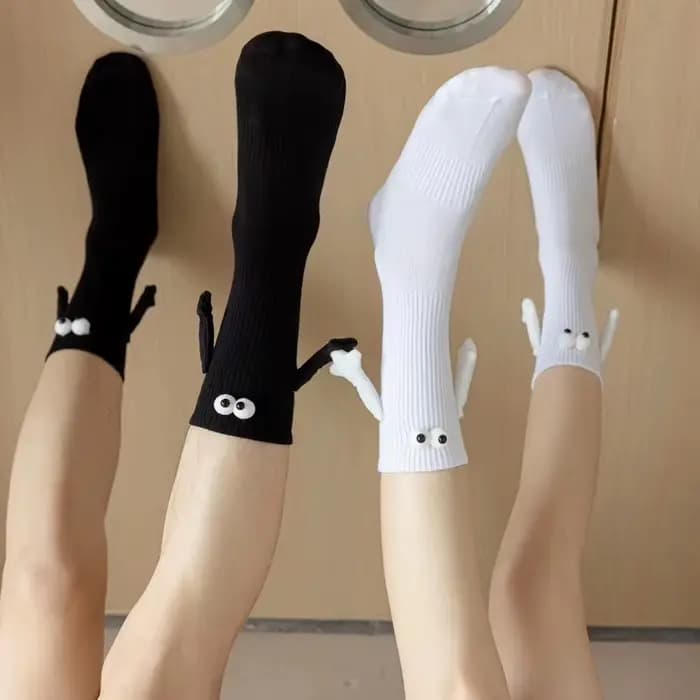 Mode dames chaussettes drôle créatif main tenant noir blanc dessin animé yeux couple chaussettes