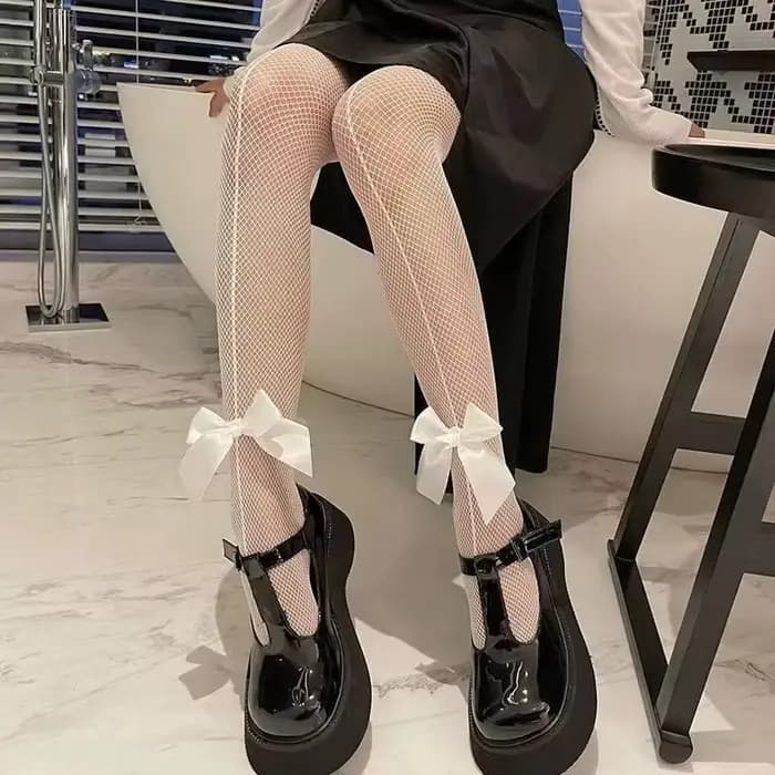 Collants résille rétro pour femme avec nœud papillon et design ajouré