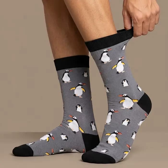 1 paire de chaussettes unisexes avec motif pingouin gris
