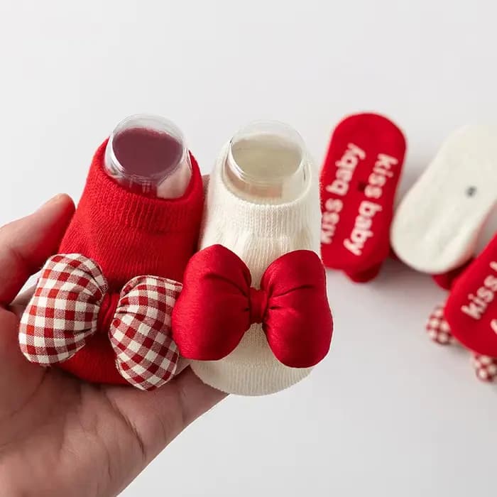 Chaussettes de noël à nœud rouge pour bébé