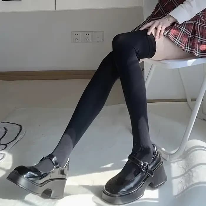 Chaussettes longues de couleur unie