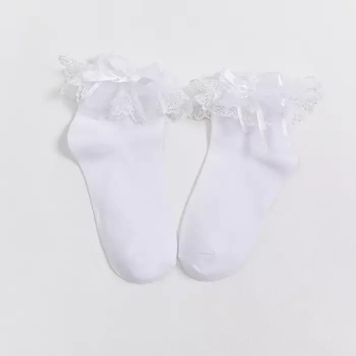 1 paire de chaussettes à volants pour femmes, chaussettes à volants noires et blanches avec bordure