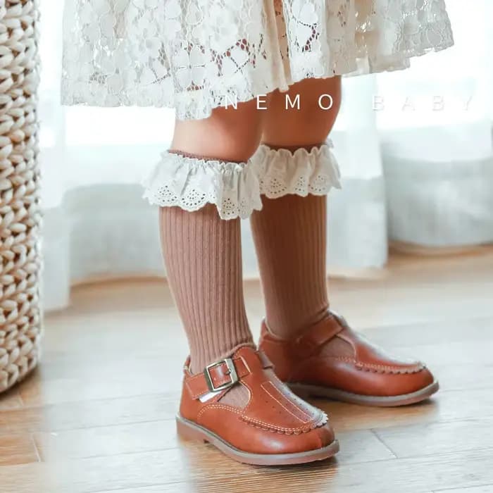 1 paire de chaussettes hautes pour bébés filles