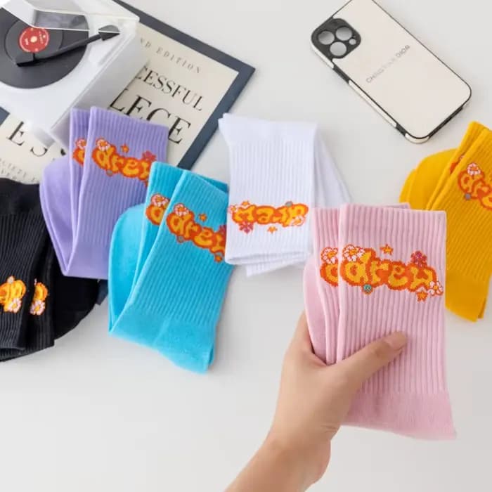Chaussettes Drew House American Streetwear avec visage de personnage de dessin animé et lettres, pour un style décontracté et sportif, en pur coton