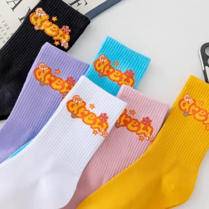 Chaussettes Drew House American Streetwear avec visage de personnage de dessin animé et lettres, pour un style décontracté et sportif, en pur coton