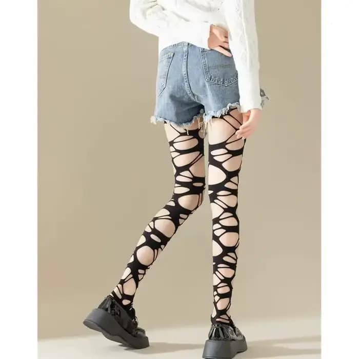 Collants résille noirs sexy déchirés pour femme