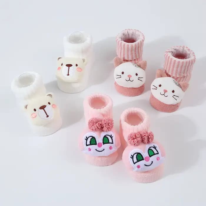 Mignon dessin animé poupée nouveau-né chaussettes printemps nouveau bébé doux solide Prewalker tricoté chaussette pour