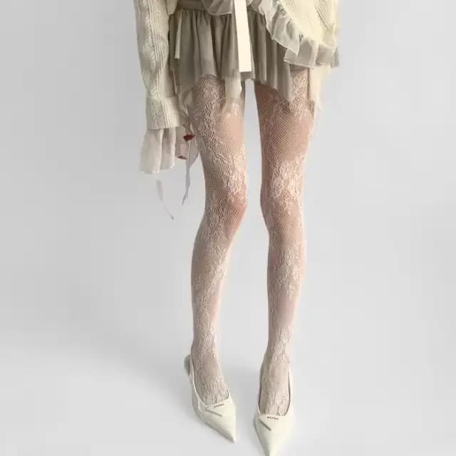 Collants en maille de dentelle ajourée blanche et noire