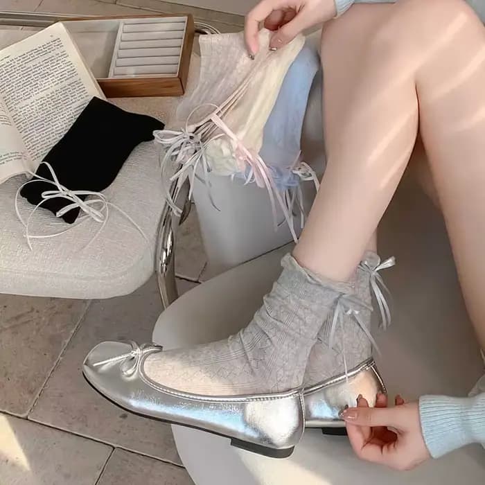 Chaussettes pour femmes Style coréen nouvelle couleur unie douce Lolita chaussettes fines mignon respirant arc mode japonaise chaussettes longues femme maille