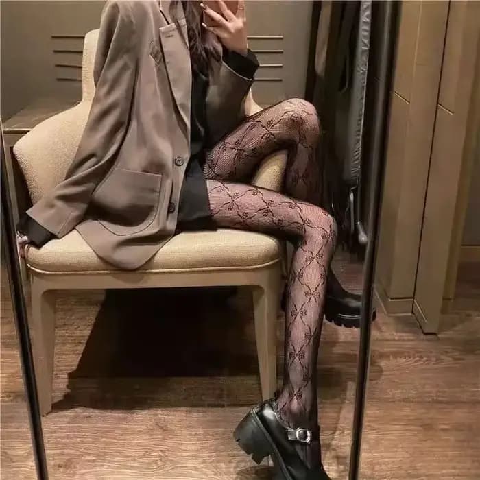Femmes Sexy noir blanc Lolita creux dentelle maille bas bas collants japonais Goth Floral rotin chaud classique collants