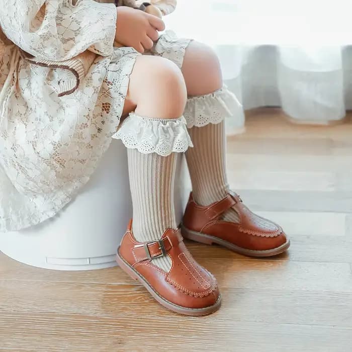 1 paire de chaussettes hautes pour bébés filles