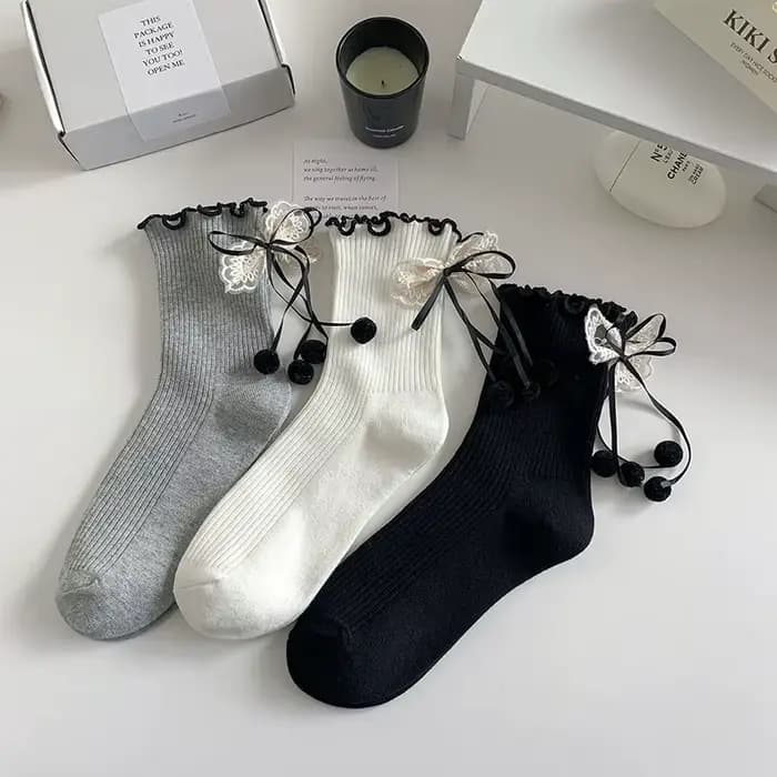 Chaussettes mi-tube en dentelle avec nœud pour femme