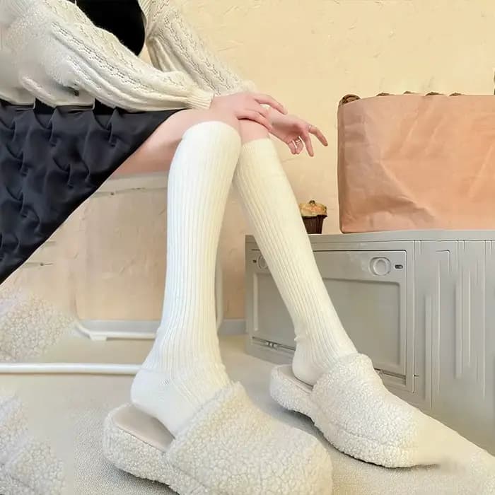 Chaussettes femme automne et hiver épais chaud couleur unie genou haut bas noir blanc rayures verticales cuisse haute chaussettes pour les femmes