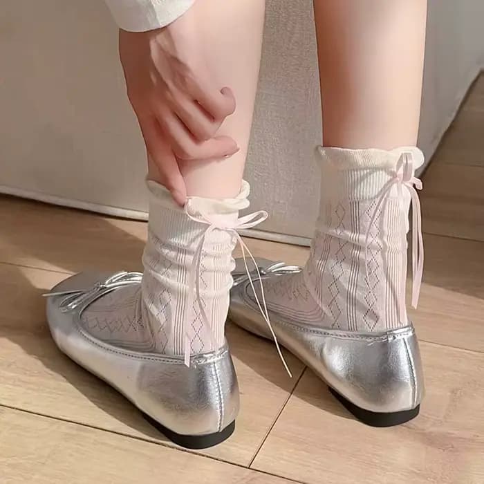 Chaussettes pour femmes Style coréen nouvelle couleur unie douce Lolita chaussettes fines mignon respirant arc mode japonaise chaussettes longues femme maille