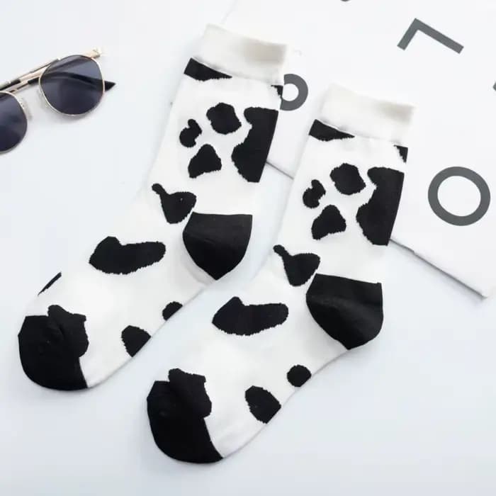 Chaussettes noires et blanches pour femmes, marque Ins Tide, chaussettes japonaises mignonnes avec Illustration de dessin animé, tête humaine, chaussettes de Skateboard