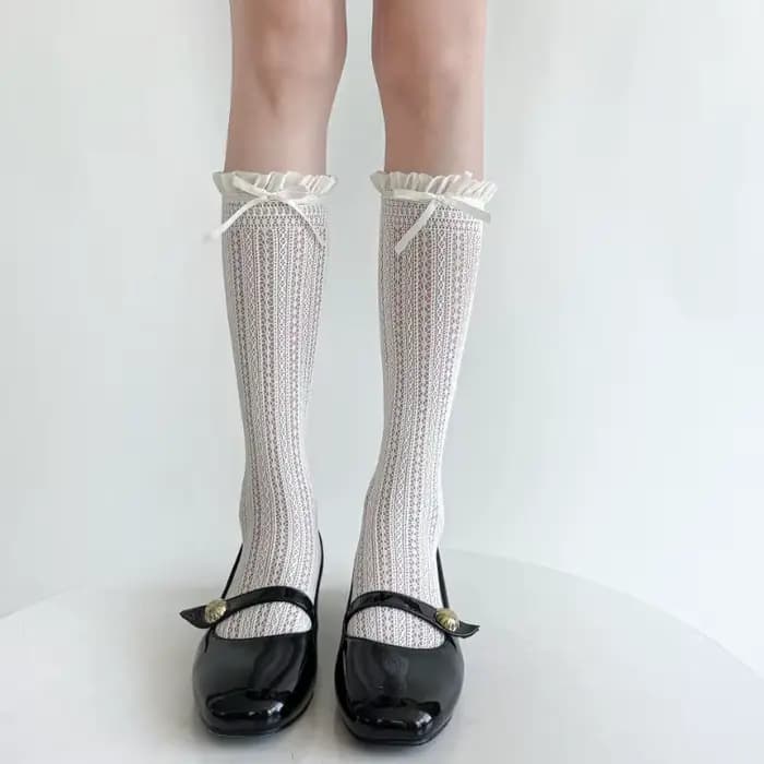 Chaussettes en dentelle fine et respirante en maille mi-mollet pour femme avec bordure