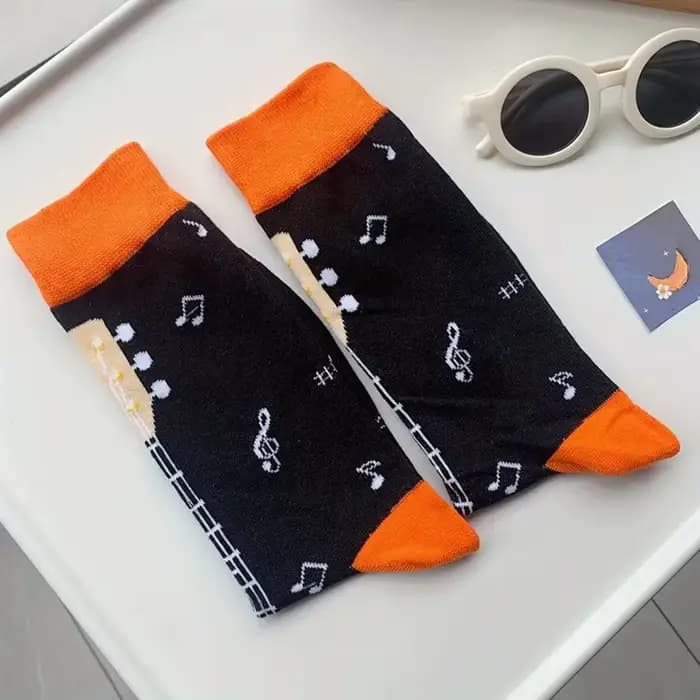 1 paire de chaussettes à motifs de guitare pour hommes