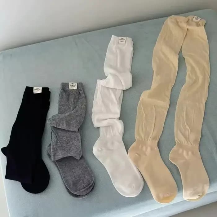 Chaussettes longues en maille respirante pour femme