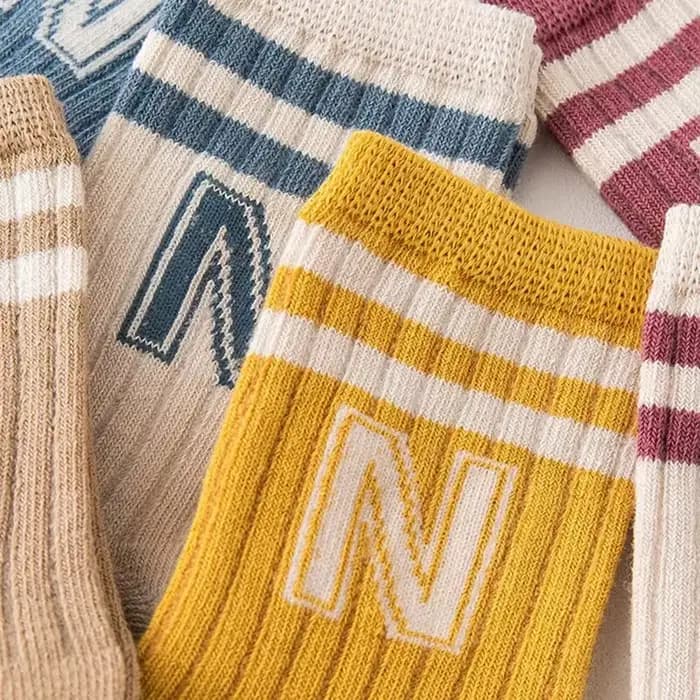 Chaussettes longues tricotées en coton doux pour bébé