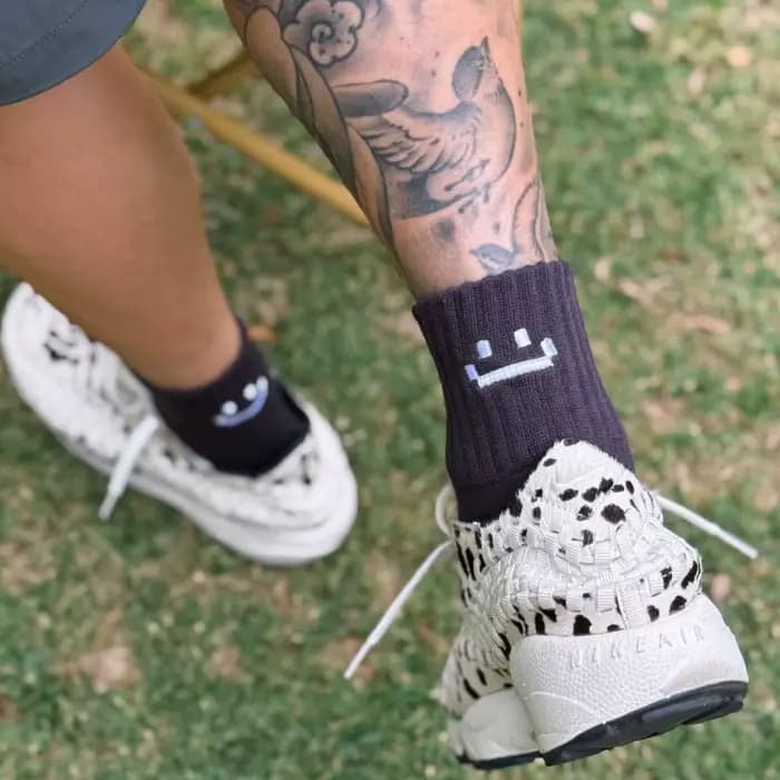 Chaussettes hommes et femmes souriant dessin animé
