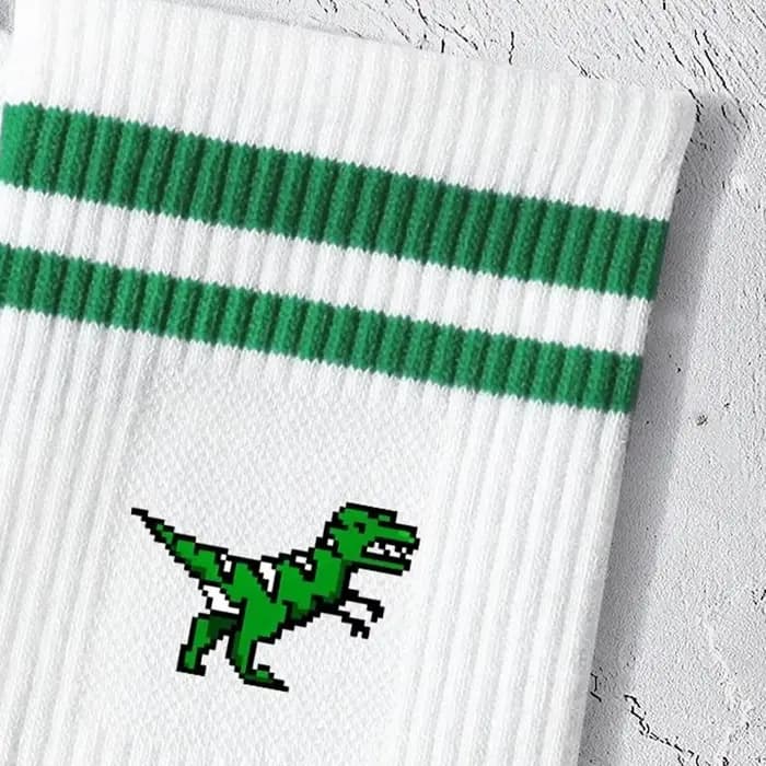 Chaussettes confortables et mignonnes de dinosaures de dessin animé à rayures vertes pour hommes et femmes