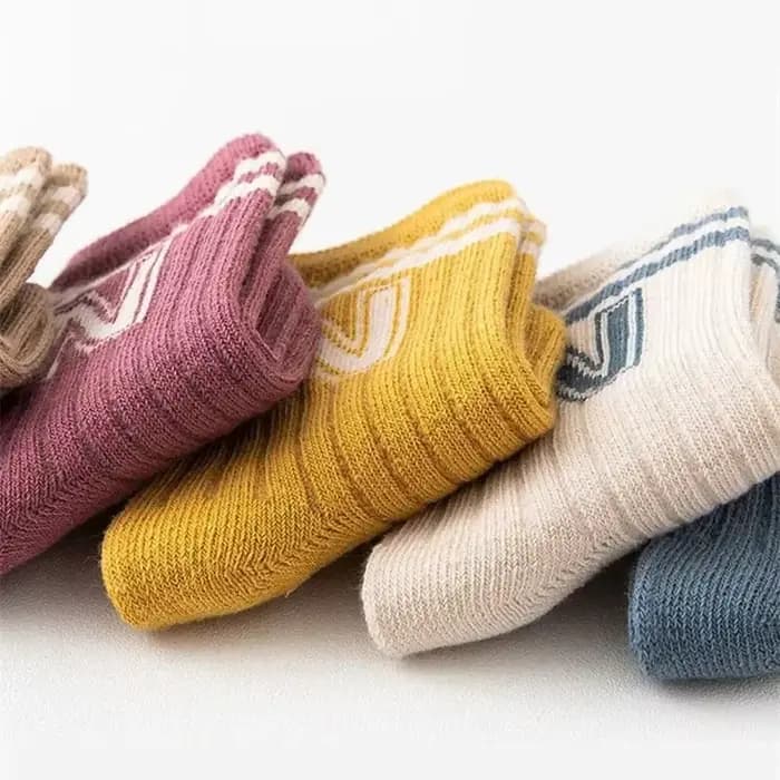 Chaussettes longues tricotées en coton doux pour bébé