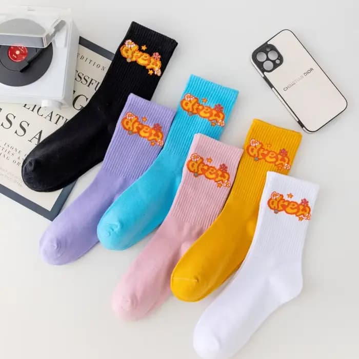 Chaussettes Drew House American Streetwear avec visage de personnage de dessin animé et lettres, pour un style décontracté et sportif, en pur coton