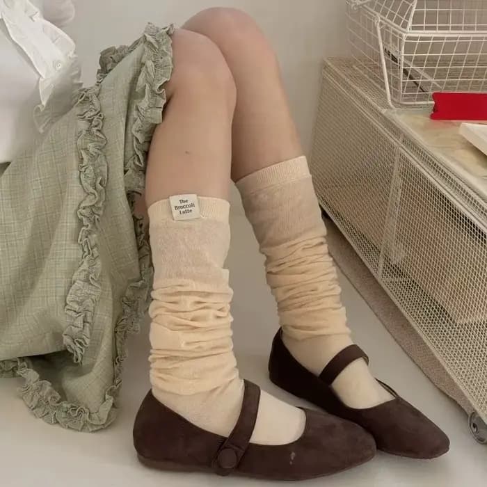 Chaussettes longues en maille respirante pour femme