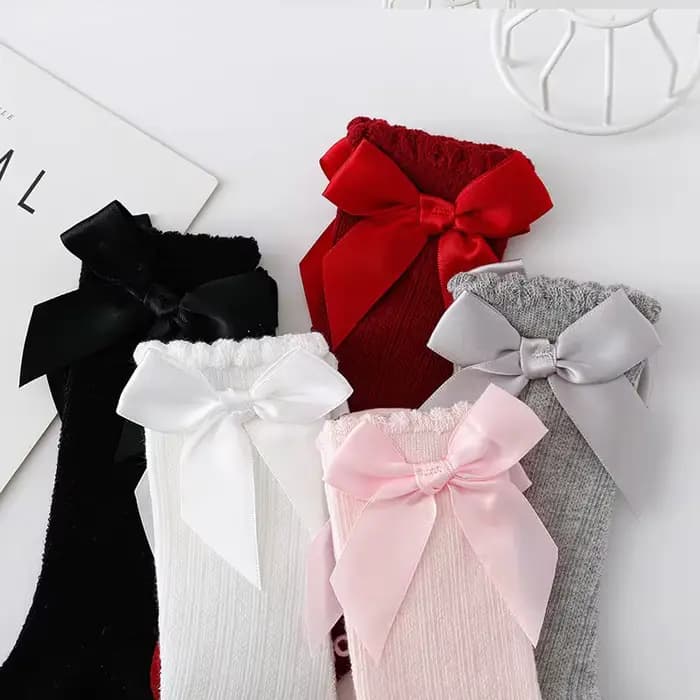 Chaussettes Tube hautes avec nœud papillon rouge