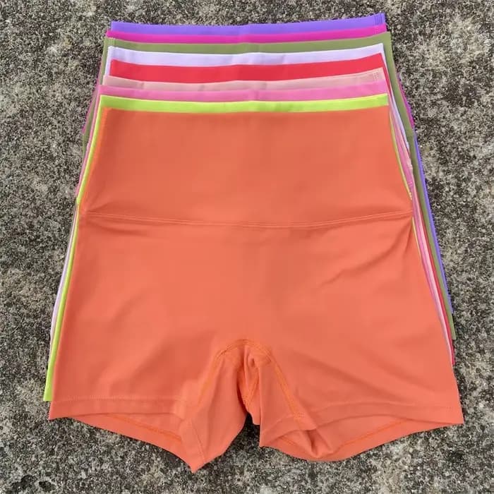 Sexy couleur unie femmes Fitness Sport court taille haute athlétique Yoga jambe courte cyclisme entraînement complet Jogging Squat preuve