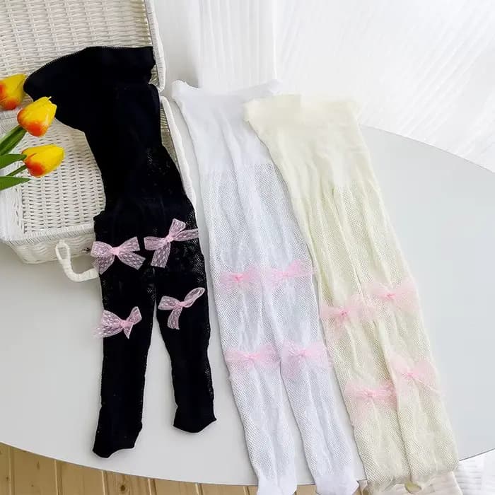 Collants en velours rose avec nœud brodé de perles