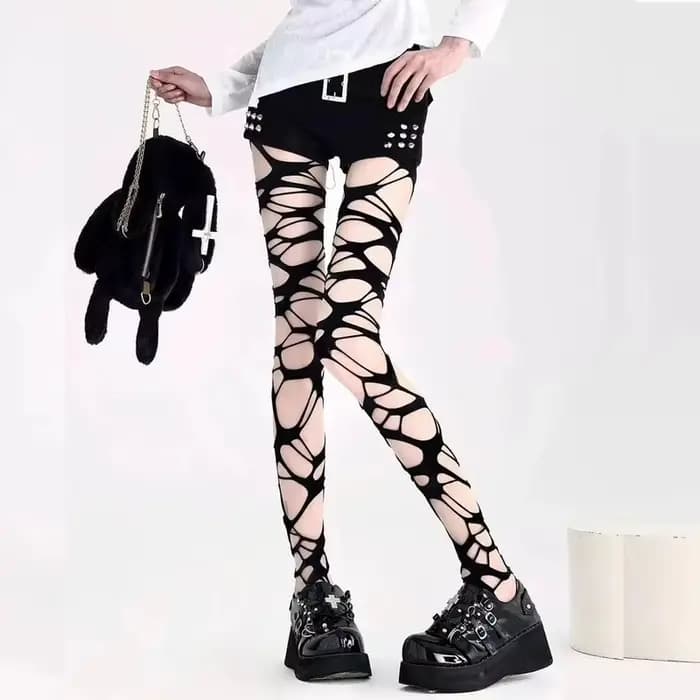Collants résille noirs sexy déchirés pour femme