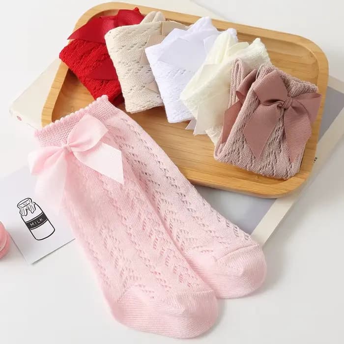 Chaussettes longues pour bébés filles en coton doux style espagnol avec nœud et dentelle ajourée pour confort quotidien et élégance