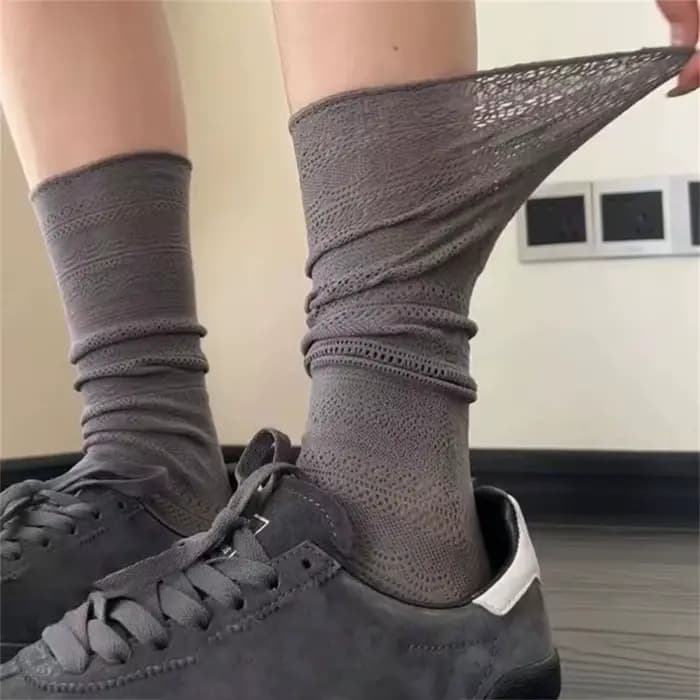 Chaussettes à poils blancs ajourés en maille douce