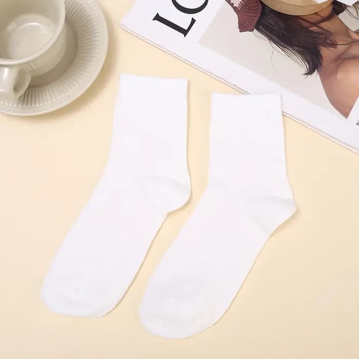 Chaussettes noires et blanches pour femmes et hommes