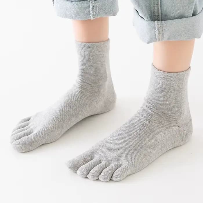 Chaussettes à cinq orteils en coton de couleur unie