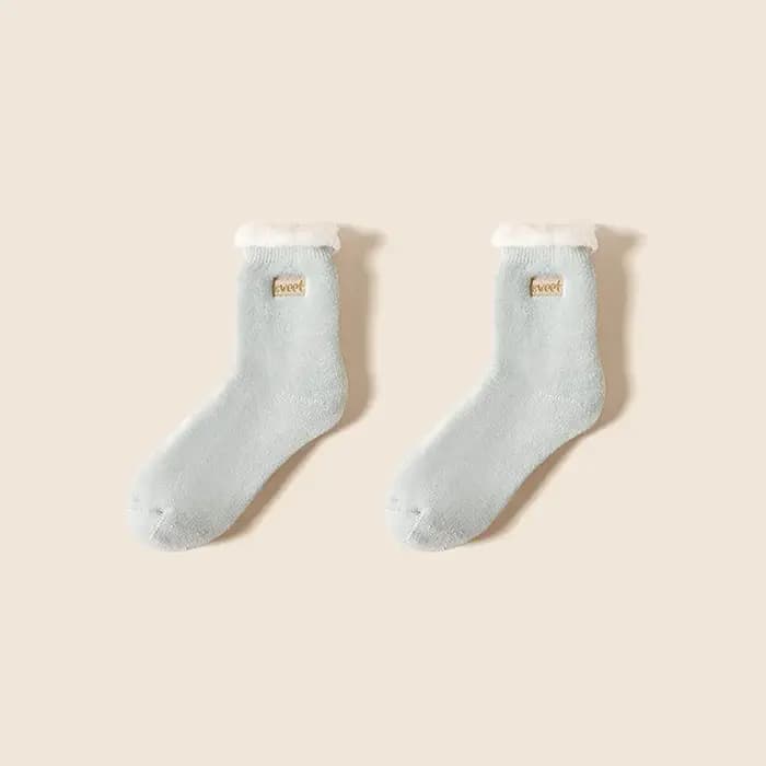 Automne et hiver nouvelles chaussettes épaisses pour femmes avec velours épaissi chaud géant épais corail